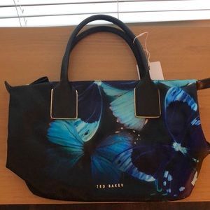 Ted Baker handbag w/ butterfly print, blk. & gold